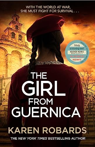 A girl with braids and a red beret stands before a historic building at sunset.