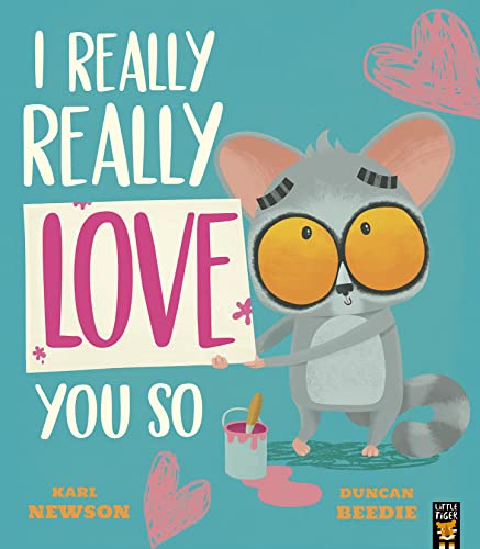 A grey lemur holds a sign reading LOVE on a blue background with hearts.