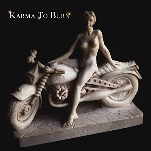 CD cover: nude figure on a motorcycle sculpture, stone texture.