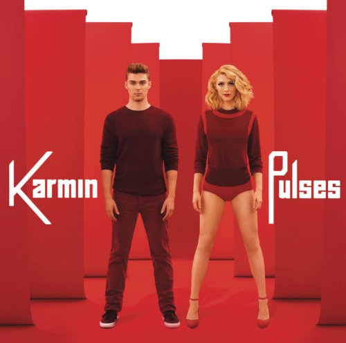 Karmin album cover, a man and woman in red against a red background.