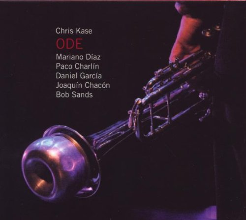 "CD cover featuring a trumpet player's hand holding a shiny trumpet against a dark background."