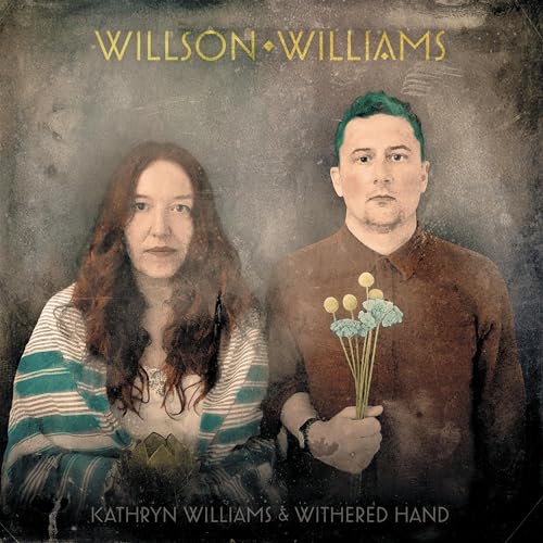 Album cover featuring portraits of two people with a floral bouquet.