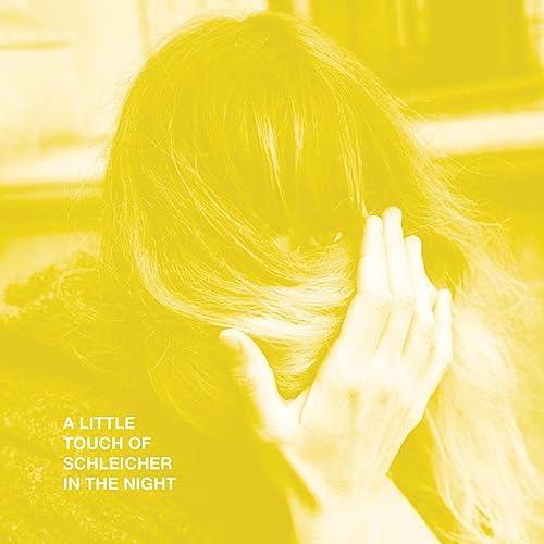 Yellow album cover featuring a person with obscured face and hands.