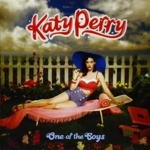 Katy Perry posing on a lounge chair in a garden for her album cover.
