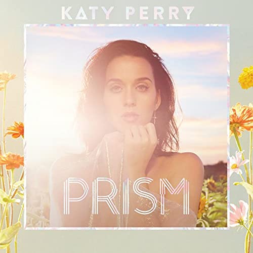 Katy Perry’s “PRISM” album cover with her portrait and floral elements.