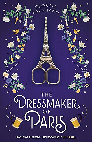 Book cover: navy blue with Eiffel Tower scissors and floral design.