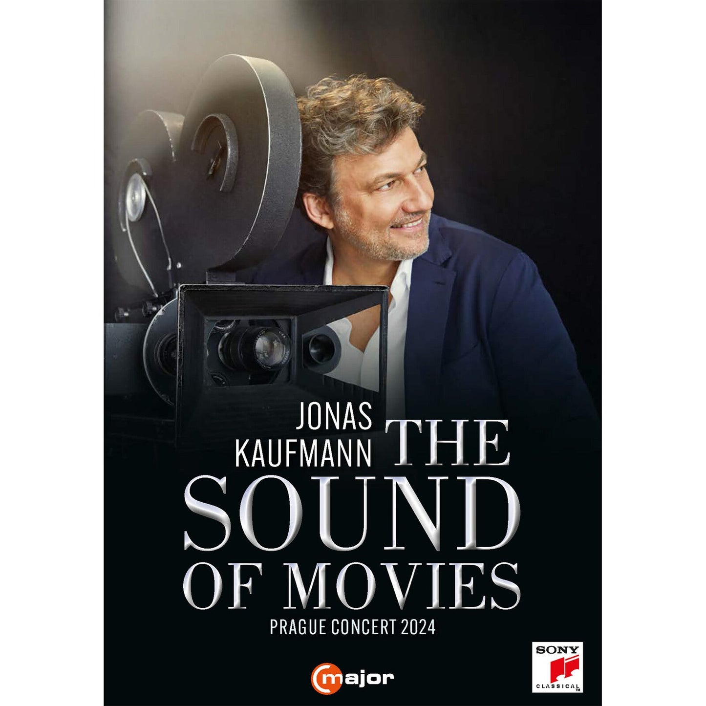 DVD cover featuring Jonas Kaufmann smiling next to a vintage movie projector.