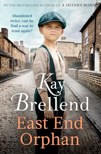 Book cover featuring a young boy in a newsboy cap on a cobblestone street.