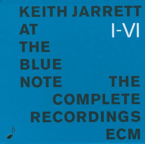 Blue album cover with black text and a small eighth note symbol.