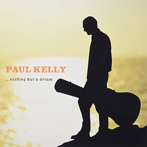 Silhouette of a man with a guitar against a sunset background.