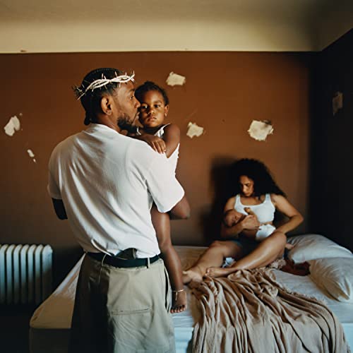 Kendrick Lamar album cover: man with child, and two women in a room.