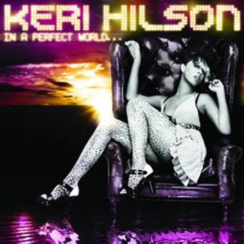 Keri Hilson album cover, seated in a chair with patterned tights.