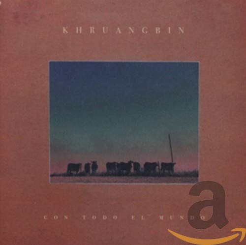 Khruangbin album cover: cattle silhouetted against a dusky blue sky.