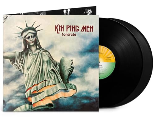Vinyl record cover featuring the Statue of Liberty against a cloudy sky with two discs.
