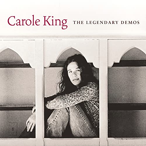 Carole King album cover: black and white portrait through a window.