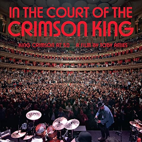 DVD cover showing a concert audience from the stage with large red text overlay.
