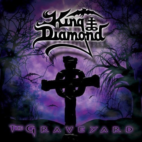 King Diamond album cover: graveyard with a cross, bats, and purple sky.