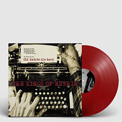 Vinyl record with red coloring and cover featuring a typewriter image.