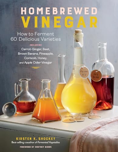 Book cover featuring glass bottles filled with various colored vinegars.