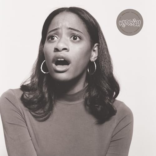 Black and white portrait of a surprised woman with hoop earrings.