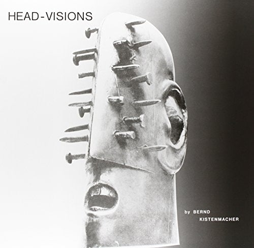 "Black and white vinyl album cover featuring a metal mask with nails."
