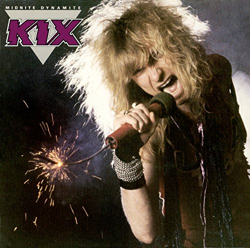 Kix “Midnite Dynamite” CD cover: singer with microphone and sparklers.
