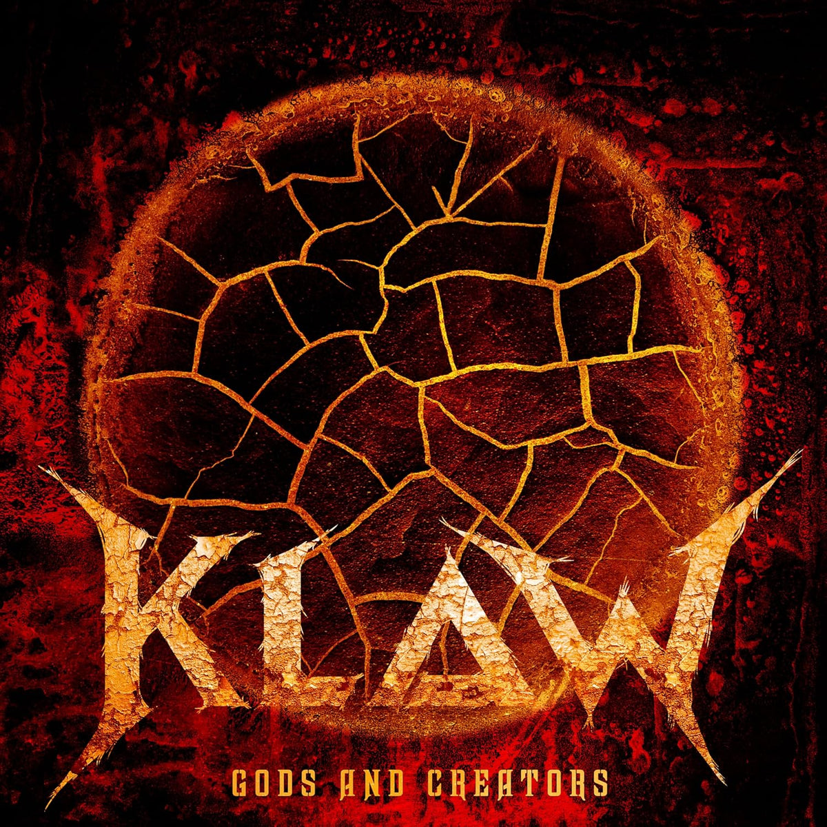 Album cover for Klaw’s “Gods And Creators” featuring cracked earth imagery.
