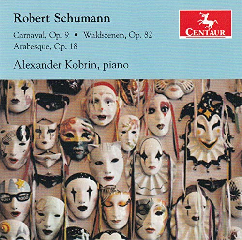 CD cover featuring a dense arrangement of colorful, decorative masks.