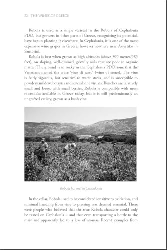 Book page with black and white photo of vineyard workers harvesting grapes.
