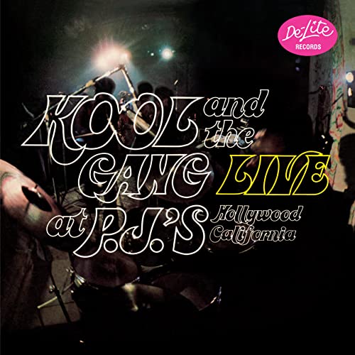 Kool and the Gang album cover with neon lettering and a blurred band.