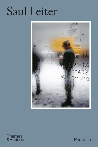 Book cover featuring a blurred photograph of a man in a yellow hat.