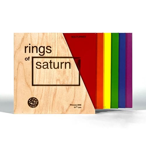 Rings of Saturn" vinyl record in a wooden case with colorful spine.