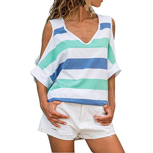 Woman wearing a blue, teal, and white striped cold-shoulder V-neck blouse with white shorts.