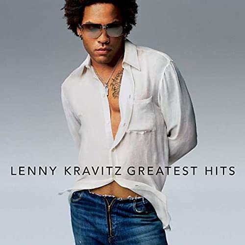 Lenny Kravitz album cover, featuring him in sunglasses and an open shirt.