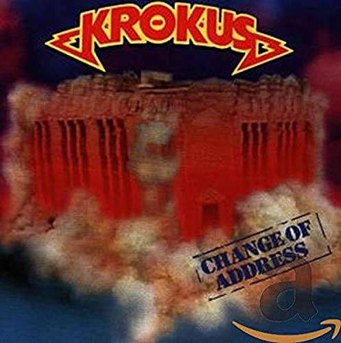 Krokus "Change of Address" CD cover: red building emerging from smoke.