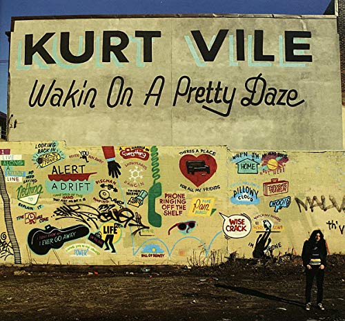 Album cover for Kurt Vile’s “Wakin’ On A Pretty Daze” with mural and figure.