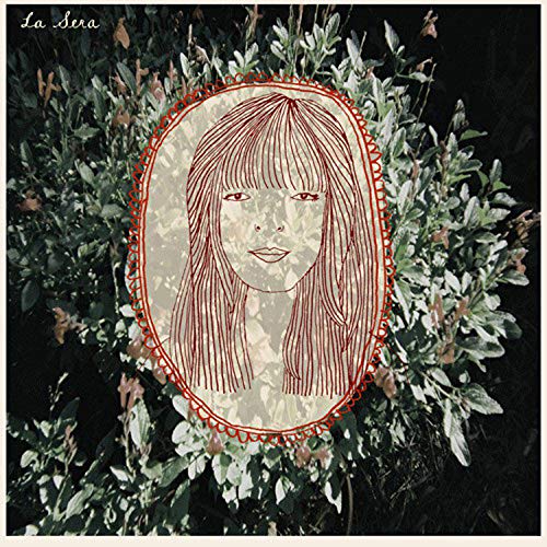 Vinyl album cover: portrait of a woman in a red-stitched oval frame.