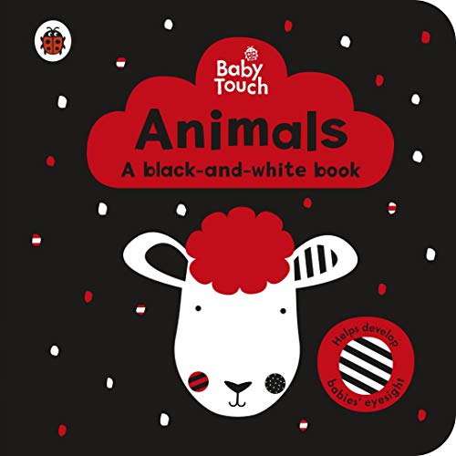 "Black book cover with white sheep, red cloud, and red, white dots."