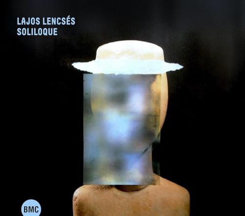 CD cover: Head-shaped glass form with a hat, dark background.
