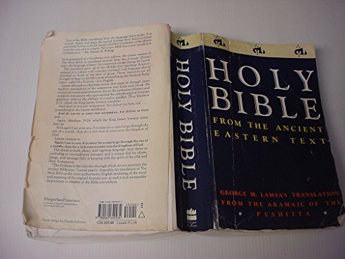 Open, worn Bible with dark blue cover displaying the title "HOLY BIBLE".