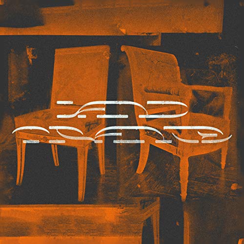 Orange vinyl record cover with two antique chairs and white lines.