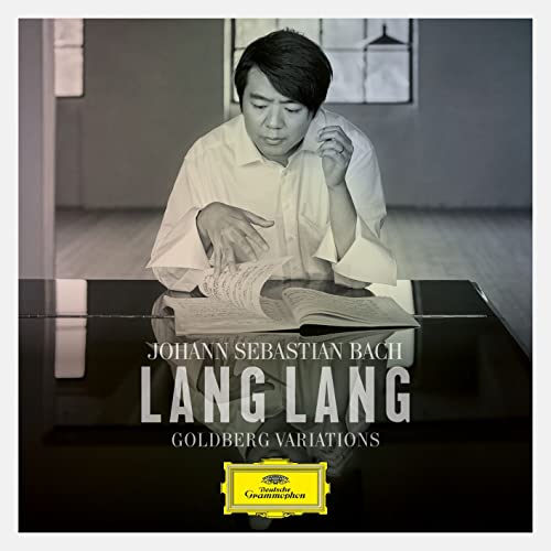 Lang Lang portrait with sheet music, album cover for Bach’s Goldberg Variations.