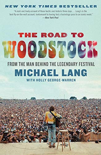 Book cover: “The Road to Woodstock” with a crowd scene below.