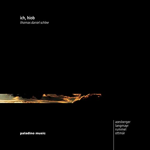 CD cover: dark background with a golden, abstract cloud-like image.