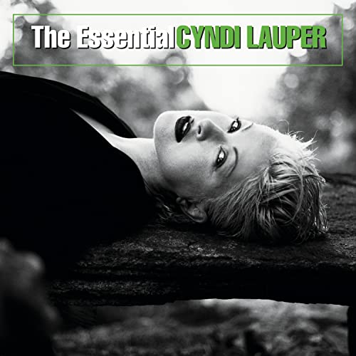 Black and white portrait of Cyndi Lauper on album cover.