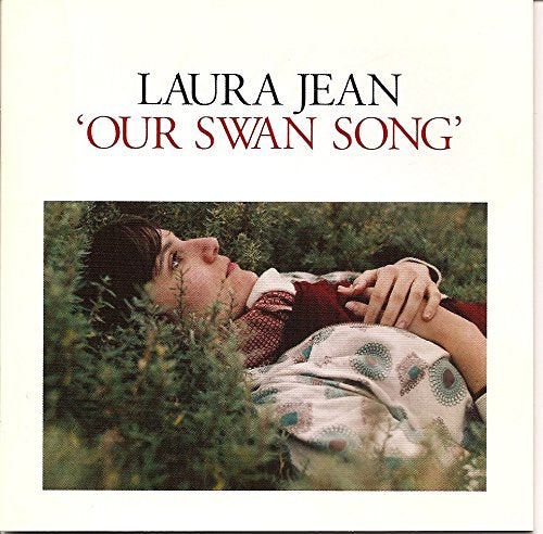 Album cover featuring Laura Jean, Our Swan Song, with a person lying in grass.