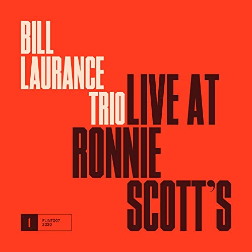 CD cover for Laurancebill Trio’s “Live At Ronnie Scott’s” album, orange background.