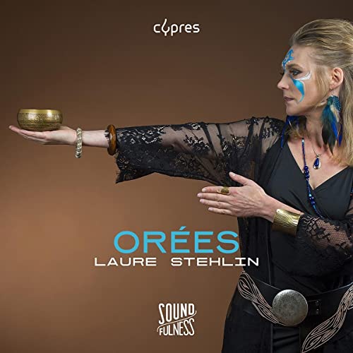 Woman with face paint holding a bowl, album cover for Laure Stehlin.