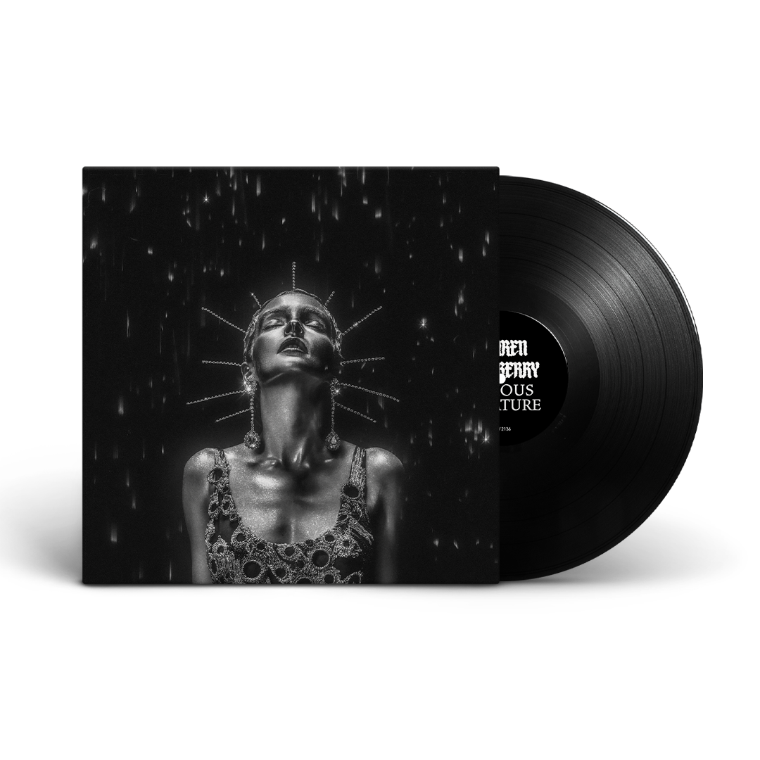 Vinyl record with black and white portrait of a woman with spikes.