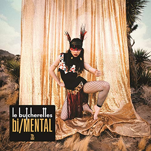 The image depicts the cover art for the album "bi/MENTAL" by Le Butcherettes. A concise, descriptive alt text for this image is: "A woman kneels in front of a gold curtain, wearing a black and red outfit."